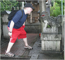 nick engaging in a screaming match at cute shrine in kyoto